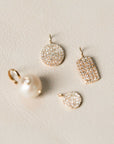 Naomi Eloise: 14k Gold Diamond Charms