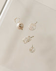 Naomi Eloise: 14k Gold Diamond Charms