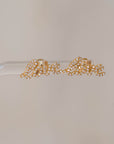 Naomi Eloise: 14k Diamond “love” stud earring