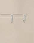 Naomi Eloise: 14k Gold Diamond Baby Huggie Earrings