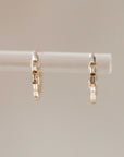 Naomi Eloise: Baguette Diamond Huggie Earring