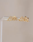 Naomi Eloise: 14k Diamond “love” stud earring