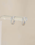 Naomi Eloise: 14k Gold Diamond Baby Huggie Earrings