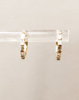 Naomi Eloise: Baguette Diamond Huggie Earring