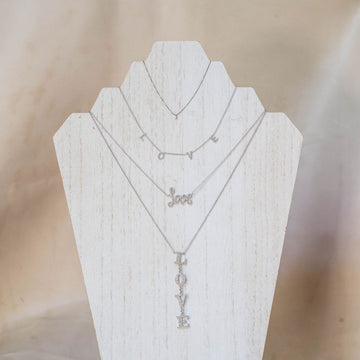 Naomi Eloise: 14k White Gold Diamond “Love”  Necklaces