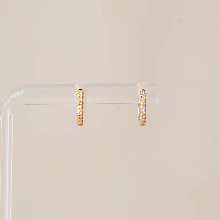 Naomi Eloise: 14k Gold Diamond Baby Huggie Earrings